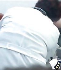Voyeur video showing hot redhead in gyno's office