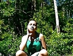 Young girl slides out of her shorts to pee quickly