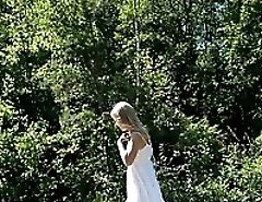 Blondie soaks up the sun while pissing alfresco