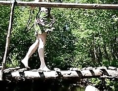 Shameless hot doll flashes her pussy while pissing