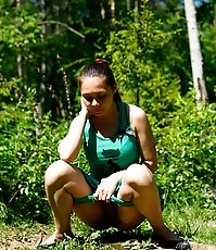 Girlie pees and puts shorts back on without wiping