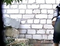 Hottie pissing outdoors like it