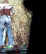 Four women pissing and chatting outdoors