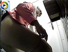 Sexy loose babe got caught on camera while pissing