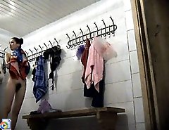 Young slim dolls getting spied after in the locker