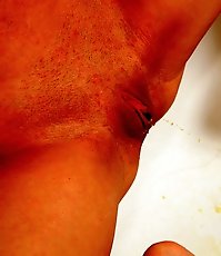 Teeny does shower masturbation and pees into bath