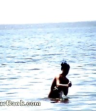 Voyeur tapes a gorgeous babe at the nudist beach