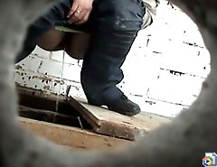 Careless chicks taking a leak in old country loo