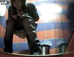 Juicy teens gets spycammed while taking a leak