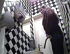 Tight-assed freshies filmed peeing by a pro voyeur