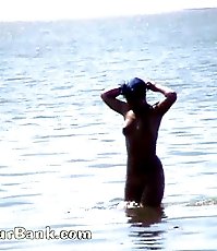 Voyeur tapes a gorgeous babe at the nudist beach