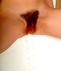 Gingerhead with a hairy beaver tinkles into the bath