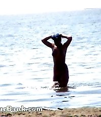 Voyeur tapes a gorgeous babe at the nudist beach