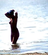 Voyeur tapes a gorgeous babe at the nudist beach