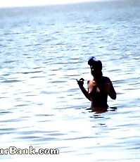 Voyeur tapes a gorgeous babe at the nudist beach