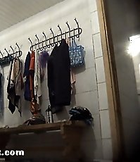 Juicy busty strips unaware of spy cam filming her