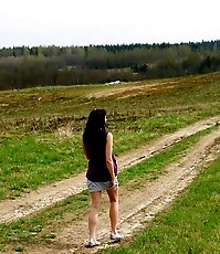 Naughty babe stains dirt road with her smelly piss