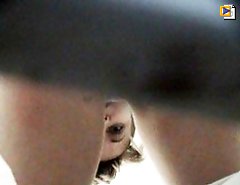 Unlucky girls get filmed tinkling in public loo