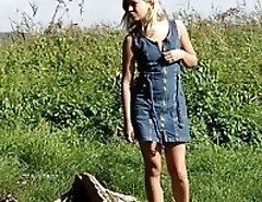 Blonde teen pissing in the park