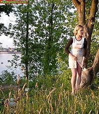 Spying on blonde teen peeing near river