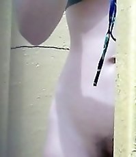 Young girl changing her bikini