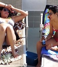 Slim bikini girls sexily posing here