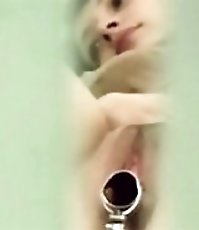 Catching a glimpse of pussy plugged with speculum