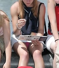 Voyeur upskirt pictures with panty peeking out in public