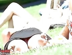 Hot girl up skirt. She wears pink dotted panties