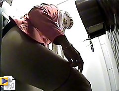 Sexy loose babe got caught on camera while pissing