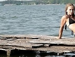 Bikini girls in sexy poses on beach