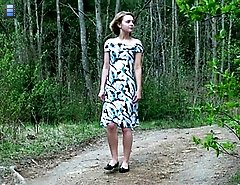 Kinky girl pisses in the middle of a forest road