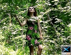 Delicious sexy brunette takes a leak in the bush