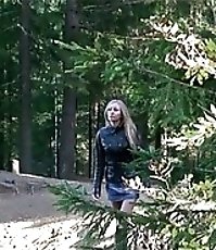 Beautiful blondie goes for a wee on an empty forest path
