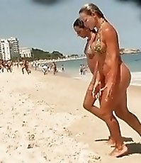Sexy babes in tiny bikinis get spied on hidden camera when walking out of the warm sea