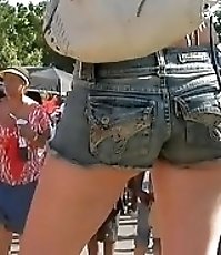 The beautiful denim shorts girls are erotically waving their nice and tight ass cheeks