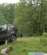 Posh hoochie takes a stop in the woods to piss
