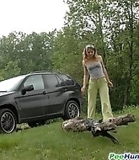 Posh hoochie takes a stop in the woods to piss