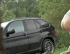 Posh hoochie takes a stop in the woods to piss