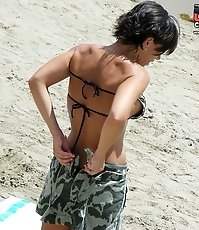 Tiny bikini thong camel toe view