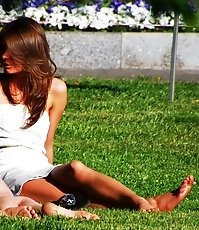 Upskirting and sunbathing in park
