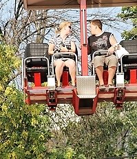 Rubbing nub through panty up skirt