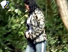 Spying on a cunning girl having a piss in the bushes