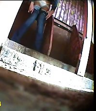 Redhair hottie gets spycammed while tinkling