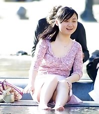 Cute upskirt girls by the fountain