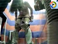 Tinkling girls pay no attention to spy cam in WC