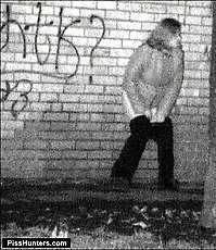 Girl takes a secret leak in the street at night