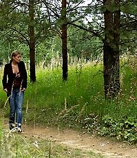 Blonde ho pissing in the middle of a country road