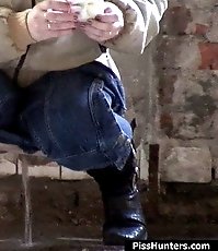 Voyeur shots of an unsuspecting girl taking a leak