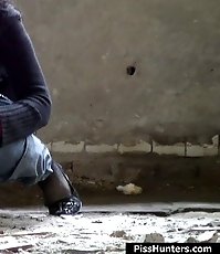 Two frisky chicklettes taking a wee synchronically